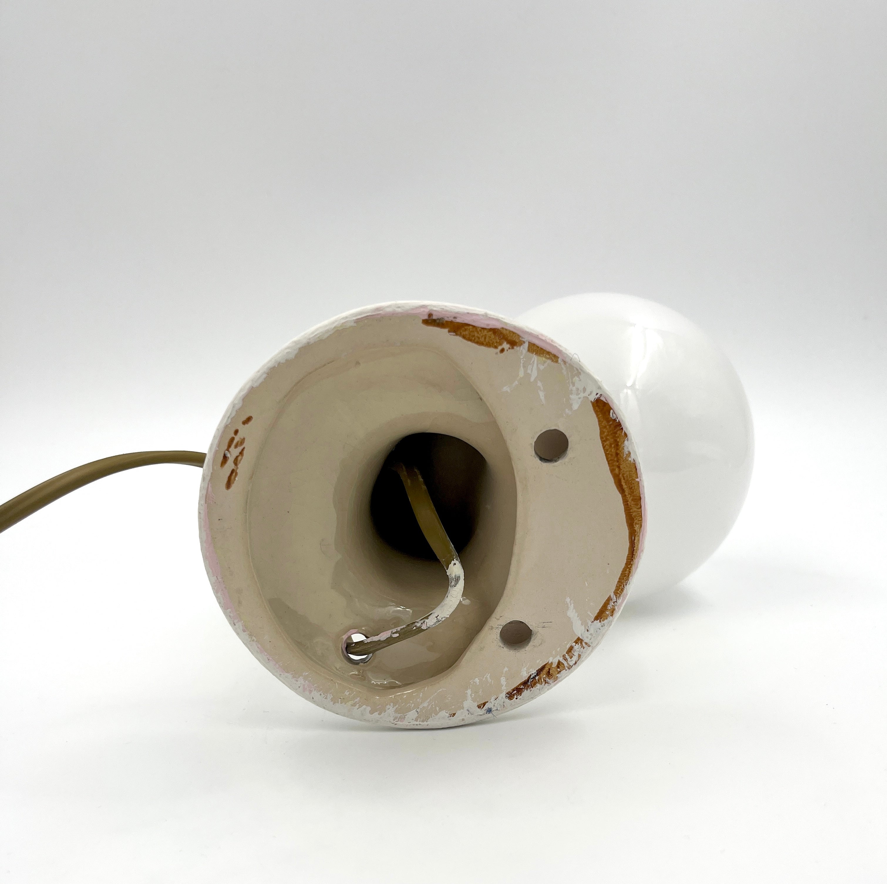 Vintage hand wall lamp with glass globe – sculptural design