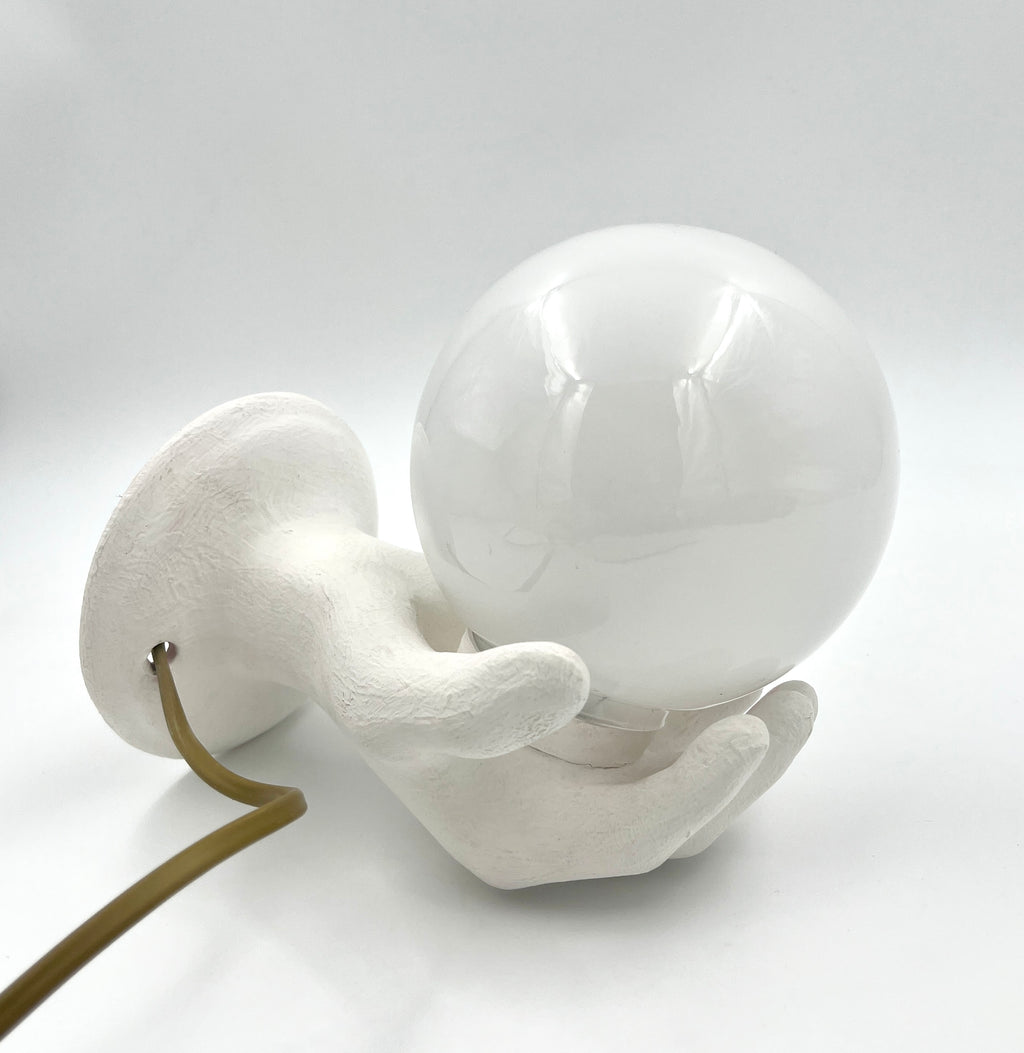 Vintage hand wall lamp with glass globe – sculptural design