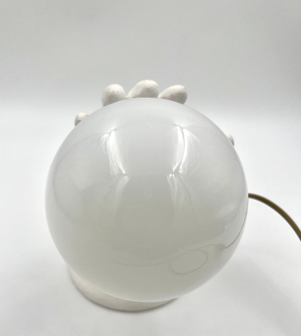 Vintage hand wall lamp with glass globe – sculptural design